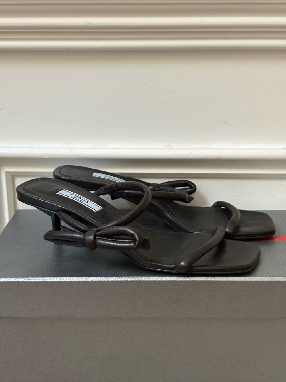 Prada triangle logo strap sandals kitten heels